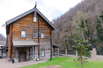 A wooden house made of circular timber