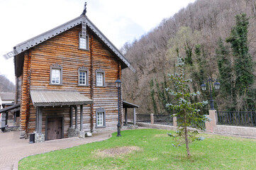A wooden house made of circular timber
