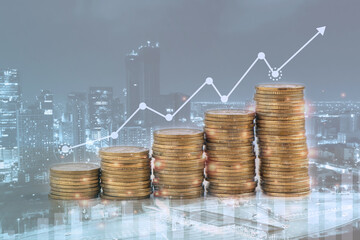 Double exposure of stacking coins with graph,condominium background  for finance and business concept.