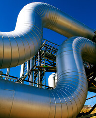 Industrial zone, Steel pipelines at sunset