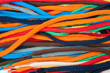 Background of colored shoelaces. Texture