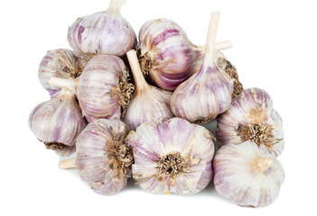 A bunch of heads of garlic on a white background