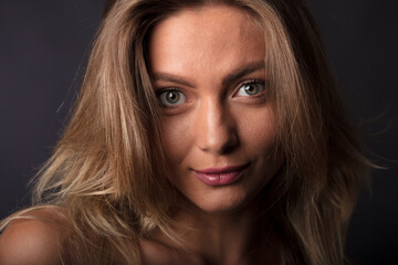 portrait of a young woman, shooting in a photo studio