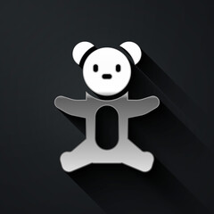 Fototapeta premium Silver Teddy bear plush toy icon isolated on black background. Long shadow style. Vector.