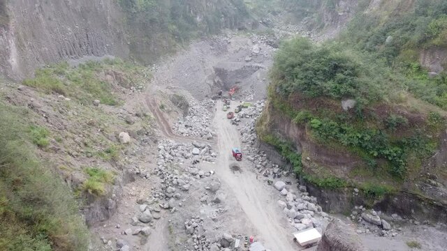 aerial footage of volcanic ravines on the slopes of Mount Merapi