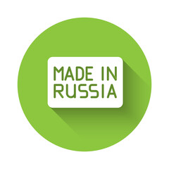 White Made in Russia icon isolated with long shadow. Green circle button. Vector.