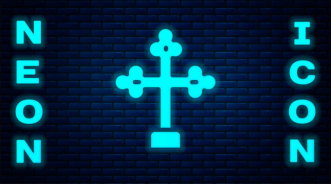 Glowing neon Christian cross icon isolated on brick wall background. Church cross. Vector.