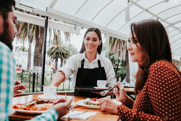 Owner latin woman waitress serving food and coffee to people sitting at restaurant in Latin america