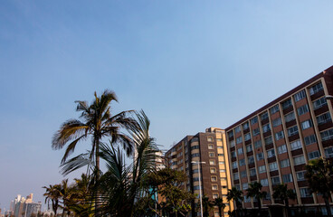 Fototapeta na wymiar Looking Up at Durban's Beachfront Hotels as taken from Golden Mile