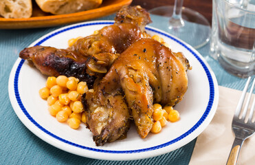 Spanish dish Pies de cerdo con garbanzos. High quality photo