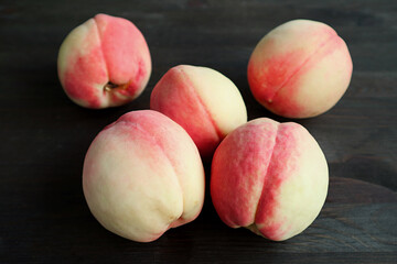Heap of Fresh Ripe Peaches on Black Background