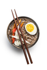 Asian noodle soup with soba noodles, vegetable and egg in bowl.