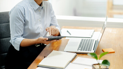 Accoutant calculating investment financial at office.