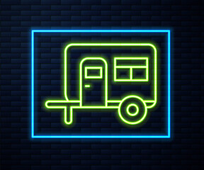 Fototapeta premium Glowing neon line Rv Camping trailer icon isolated on brick wall background. Travel mobile home, caravan, home camper for travel. Vector.