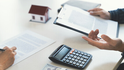 Concept of Property, Real estate agent with customer rent or buy house with contract.