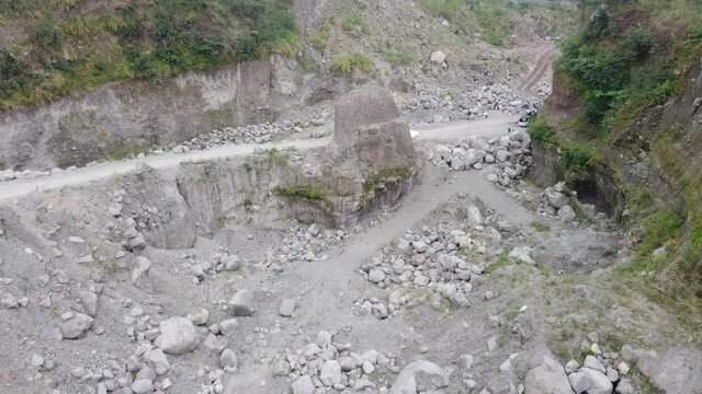 aerial footage of volcanic sand mining