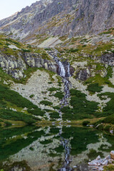 Velicky vodopad waterfall with Velicke pleso lake in Velicka dolina valley in Vysoke Tatry mountains in Slovakia © honza28683