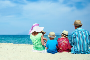 happy family at sea in greece on nature background