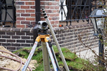 Theodolite geodesic works on building site
Landscape leveling building with theodolite geodesic...