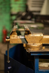 vise on the workbench, locksmith tool on the desktop