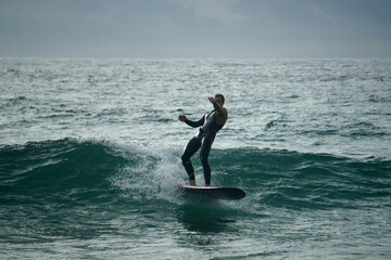 male surfer falling