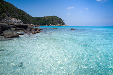 Clear sea water can see the sandy beach in Racha Island, Phuket, Thailand.