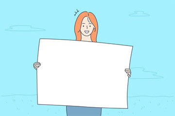 Promotion, business, advertising, protest concept. Young happy smiling businesswoman clerk manager girl cartoon character protestor holding banner in hands looking at camera. Corporate promo ads.