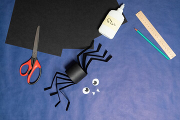 DIY Halloween paper spider. Halloween craft step by step instructions. Step 13.