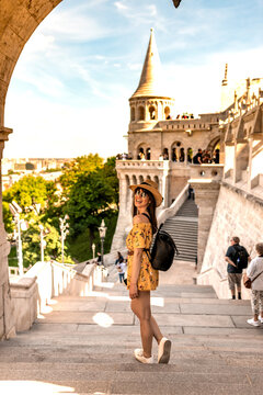 A young woman enjoying her trip to the Castle of Budapest