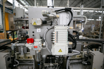 Machine part with pneumatic equipment and hydraulic system, electric part and a mechanical device for manufacturing in the industrial factory