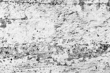 Fototapeta premium Texture of a concrete wall with cracks and scratches which can be used as a background