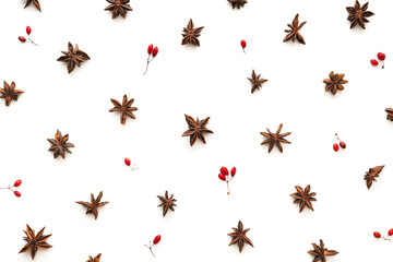 Christmas Pattern With Anise Stars And Red Berries Isolated On White - 378075031
