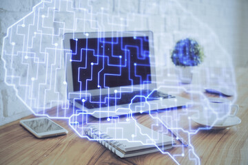Multi exposure of work space with computer and human brain hologram. Brainstorm concept.