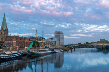 Bremen city river side with old building ship boat
