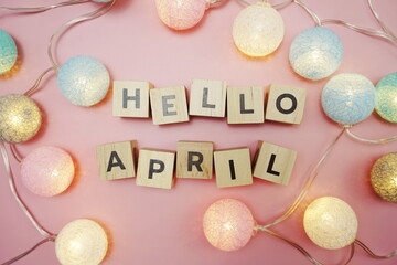 Hello April alphabet letter with space copy on pink background