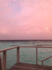 View of the pink sunrise on the pier
