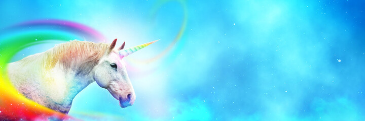 Ancient mythical unicorn with colorful rainbow. Panoramic style with wide copy space. - obrazy, fototapety, plakaty