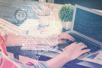 Man with computer background with brain theme hologram. Concept of brainstorm. Double exposure.