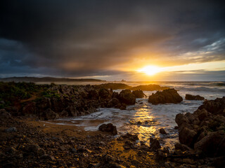 cloudy sunset on liencres beach (Cantabria - Spain) - coastal landscape - no stress and relax concept