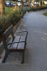 Fototapeta na wymiar Bench in an urban park