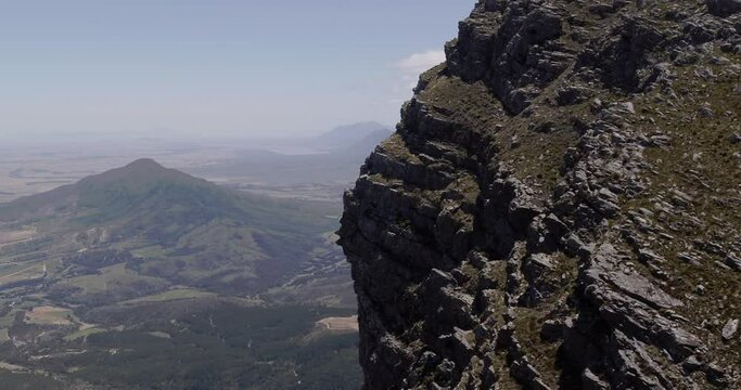 4K Drone Aerial Shot Orbiting Rocky Mountain Face Near Paarl Du Toitskloof Mountain Range Western Cape South Africa