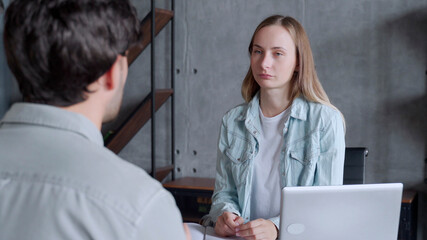 Fototapeta premium Human resources manager conducting job interview with applicant in office