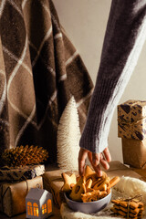 New Year gingerbread cookies on a table decorated for Christmas Eve table