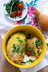 Stuffed peppers served with sour cream and bread, a traditional dish of different nations.