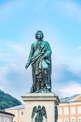 Fototapeta na wymiar Mozart Monument in the Mozart Square, Salzburg, Austria