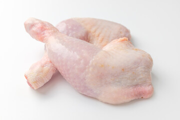 Trimmed chicken legs on a white background