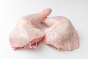 Trimmed chicken legs on a white background