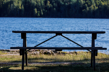 Torsby, Sweden A little beach on the Mellan-Fryken body of water and picnic table.