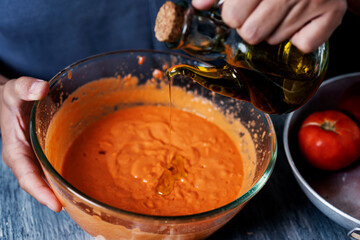 preparing porra antequerana, a cold tomato soup