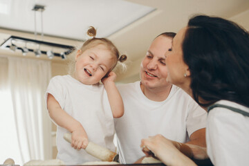 Obraz premium A family with child. Weekend at home. Spending time together